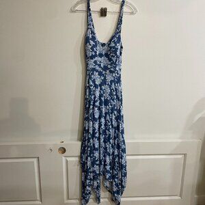 Blue floral jersey knit dress with handkerchief hem